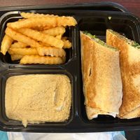 Falafel wrap with hummus and fries  at Thyme in Canton