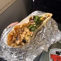 7€ for this burrito : rice, tofu, chili sauce, tomato, corn, coriander and guacamole (additional fees for the guacamole)   at Cuchara - Hapjeong Station in Seoul