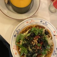 Small pumpkin soup with 2 slices of bread (5,50€) + Savory sweet potato waffle (14€)  at CLO in Antwerpen