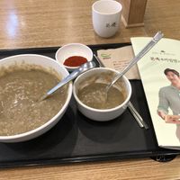 Mung Bean Porridge, ask for no fish sauce on the side. Pictured is a chili powder instead 🌶  at Bonjook & Bibimbap Cafe in Incheon