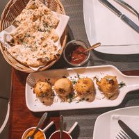 Naan bread garlic and appetizer  at Saffron Mantra Indian in Carvoeiro