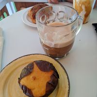 Latte with almond milk and key lime vegan muffin at Midway Cafe and Coffee Bar in Islamorada