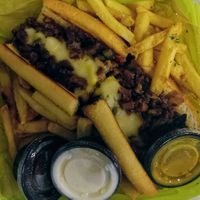 Vegan Philly cheese steak with truffle fries at The Rabbit Hole in Pompano Beach