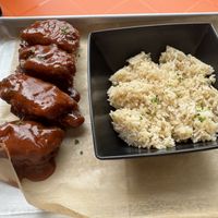 Bbq wyngs and jasmine rice   at The Rabbit Hole in Pompano Beach
