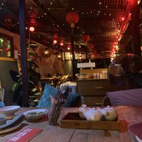 Interior on the backside over looking Rice fields on the right side from the photo at Sista the Dumpling Shack in Kuta