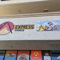 The sign says #1 plant base restaurant in Compton but they serve meat. at Sunny Express Mexican Chinese in Compton