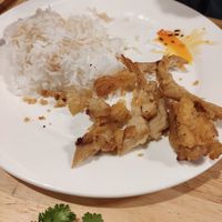 Pollo con arroz at Mina Hostel in Thakhek