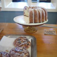 There are a variety of fresh (and so tasty) baked goods in a case by the cash register at Chase's Daily in Belfast