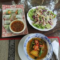 Veggie spring rolls (carrot cucumber and lettuce), papaya salad and amok curry with tofu at Peace Cafe in Siem Reap