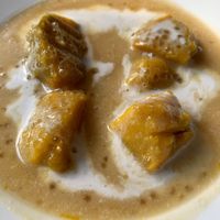 Local warm pumpkin coconut dessert - yummy!! at Peace Cafe in Siem Reap