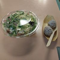 salad with quinoa, raw chocolate balls at Cruda Cafe in Toronto