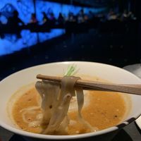 Spicy miso ramen (with thick onion slices on top) at Vegan Ramen UZU Kyoto in Kyoto