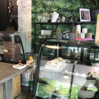Deli case with desserts at Yemaya's Vegan Corner in Amsterdam