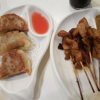 Pan fried dumplings and satay chicken scewers at Easy House in Gold Coast