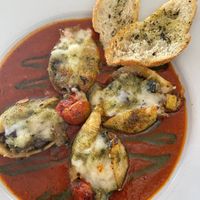 Vegan ratatouille stuffed shells with added vegan mozzarella cheese. So so good    at Tommyknocker's in Port Townsend