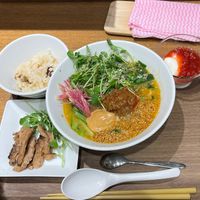 Golden sesame ramen, with extra soy. Came with a side of rice and a dessert (plant based yoghurt and jam?)  at T's Tantan - JR Ikebukuro in Tokyo