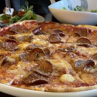 Plant-based pepperoni pizza at Mahina Vegan Table in Seoul