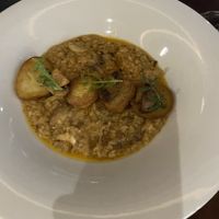 Grilled mushroom cheese risotto   at Mahina Vegan Table in Seoul