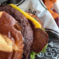 “Bacon” cheeseburger, yams, purple cabbage  at A Peace of Soul in Columbia
