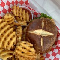 Waffle fries and fried “chicken” sandwich   at A Peace of Soul in Columbia