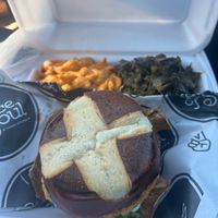 “Chicken” sandwich w/ mac & chz & collards. Everything on menu is 100% vegan    at A Peace of Soul in Columbia