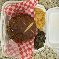 Bbq fried chicken sandwich with Mac and cheese & collards  at A Peace of Soul in Columbia