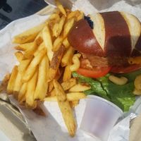 Mac n Cheese Burger with cajun fries. Forgot to add the mint tea because I sucked that goodness down too quickly! at Green Gene Vegan Cafe in Albuquerque