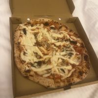 Vegan Margherita with added vegan mozzarella, mushroom and garlicc   at Gusto Pizza in Taipei