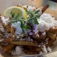 Squeeze the lemon to bring out the feta flavor at Kale My Name in Chicago