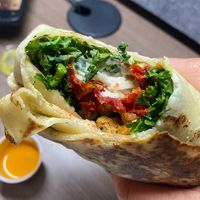 Italian seitan wrap with vegan aioli and mozz  at Kale My Name in Chicago