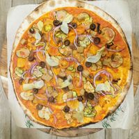 Veggie pizza, with vegetables and seitan, olives and possibility of vegan mozzarella. 100 % organic ingredients.  at Ecopizza in Cerdanyola Del Valles