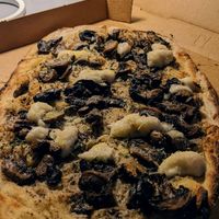 Magic mushroom pizza at Nonna's Nightmare in West End