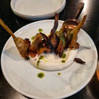 Battered artichokes with lemon cream and pesto at Nonna's Nightmare in West End