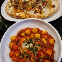 Potato, rosemary & sausage pizza with "beef" ragu gnocci. at Nonna's Nightmare in West End