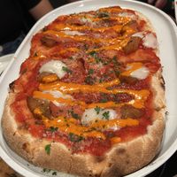 ITALIAN NIGHTMARE $26.50 Tomato, mozzarella, grilled pineapple, VBacon, Chilli, Lime aioli. (1 of our chosen Banquet Pizza Options)  at Nonna's Nightmare in West End