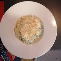 Potato gnocchi in plant based cream spinach sauce topped with vegan parmegio.  at The Street  in Prague