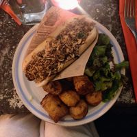 Hot dog with rhum fried onions 😋 at L'Embuscade in Paris