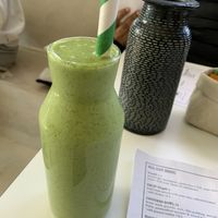 Tropical smoothie minus honey add spinach    at Against The Grind in Mill Park