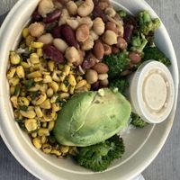 Beans, avocados, 🥦 and 🌽 on Jasmine rice 🍚   at Bolay in Palm Beach Gardens
