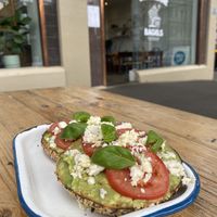 Avo, tomato, basil and vegan feta on a mixed seed bagel  at Bricklane Bagels in South Melbourne