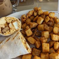 Rustic wrap with beyond sausage and scramble tofu at Queens Coach in Niagara Falls