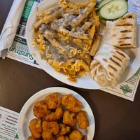 Cauliflower Wings & Bacon Chickn Ranch Wrap at Queens Coach in Niagara Falls