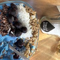 Yummy açaí bowl. Not so sure why they put the nuclear blue dye in it 😳  at Liquid Prana in Playa Del Carmen