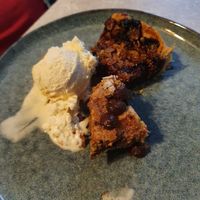 Vanilla ice cream with 
a) blueberry pie
b) chocolate and fudge cake. Best enjoyed with coffee on the side. at Skrymslet Under Trappan in Norrkoping