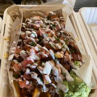 Chili cheese fries with extra $3 toppings “supreme” style  at Chicana Vegana in Fullerton