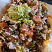 Loaded nachos - a MUST order!  at Chicana Vegana in Fullerton