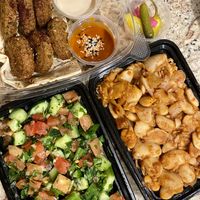 Cucumber salad, broad beans stew, and falafels  at Vegan Stops in Garden Grove