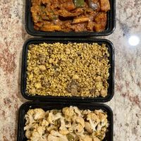 Eggplant stew, bulgur and chickpeas, and sautéed cauliflower  at Vegan Stops in Garden Grove