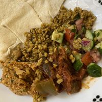 Pita, cucumber, eggplant stew, mushroom bulgur wheat  at Vegan Stops in Garden Grove