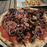 Vegetarian pizza with no cheesee  at Il Pellicano Cucina Italiana in Caye Caulker